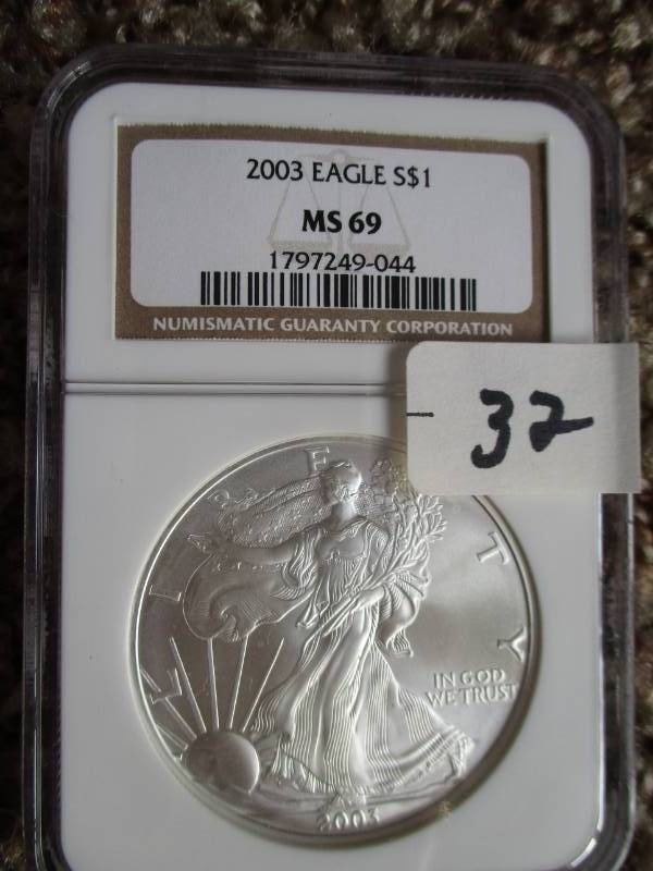 lot 32 image: 2003 Silver American Eagle MS69