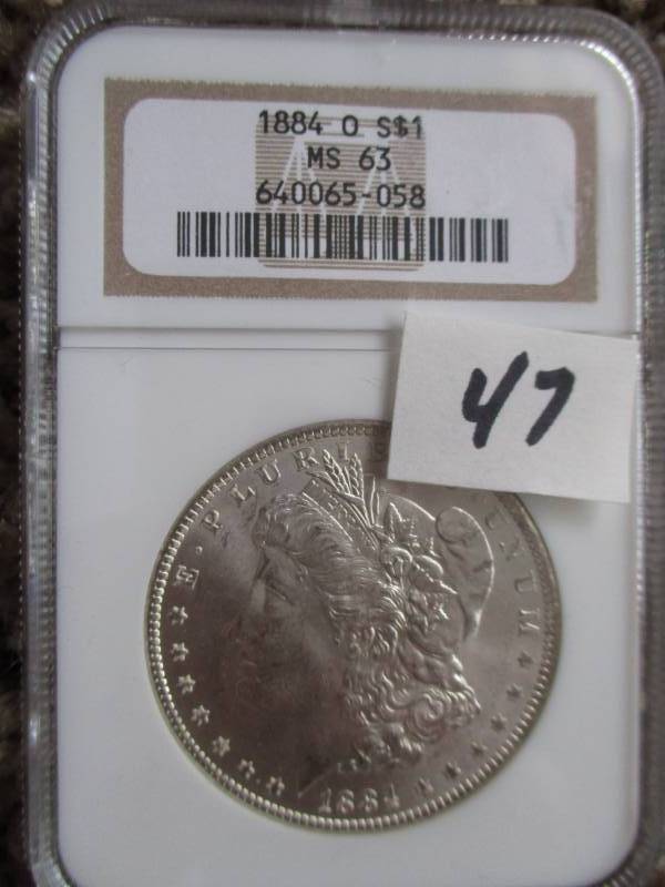 lot 47 image: 1884 O Morgan Silver Dollar MS63