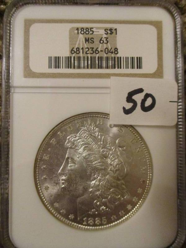 lot 50 image: 1885  Morgan Silver Dollar MS63