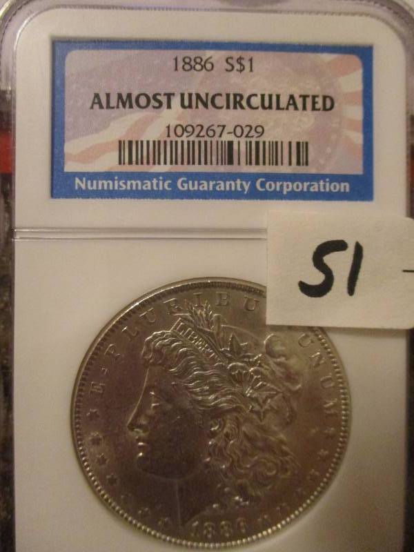 lot 51 image: 1886 Morgan Silver Dollar Au