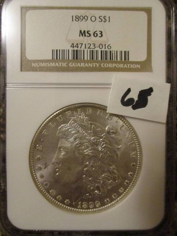 lot 65 image: 1899 O Morgan Silver Dollar MS63