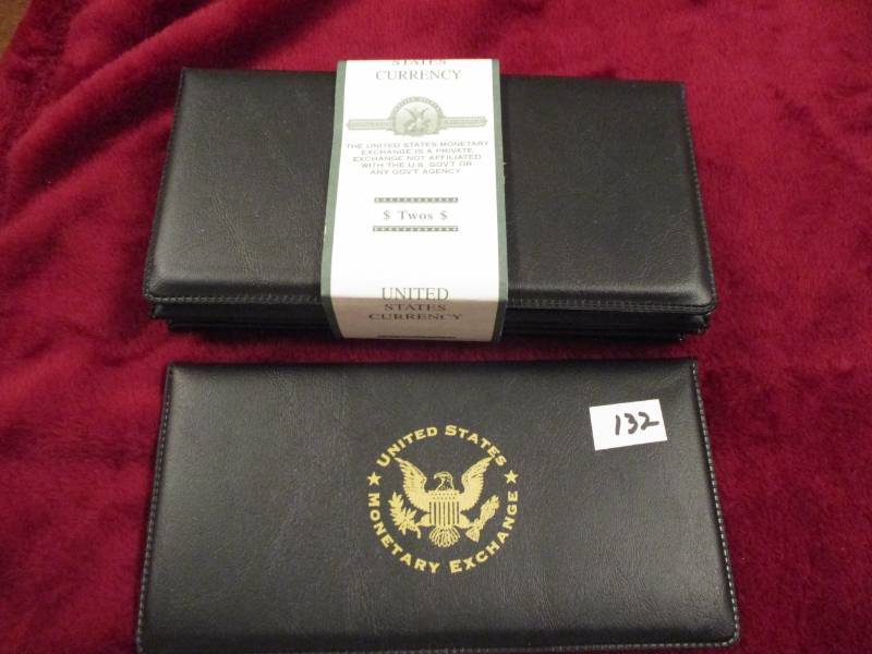 lot 132 image: 5 2003 UNC $2 Bills in Folders