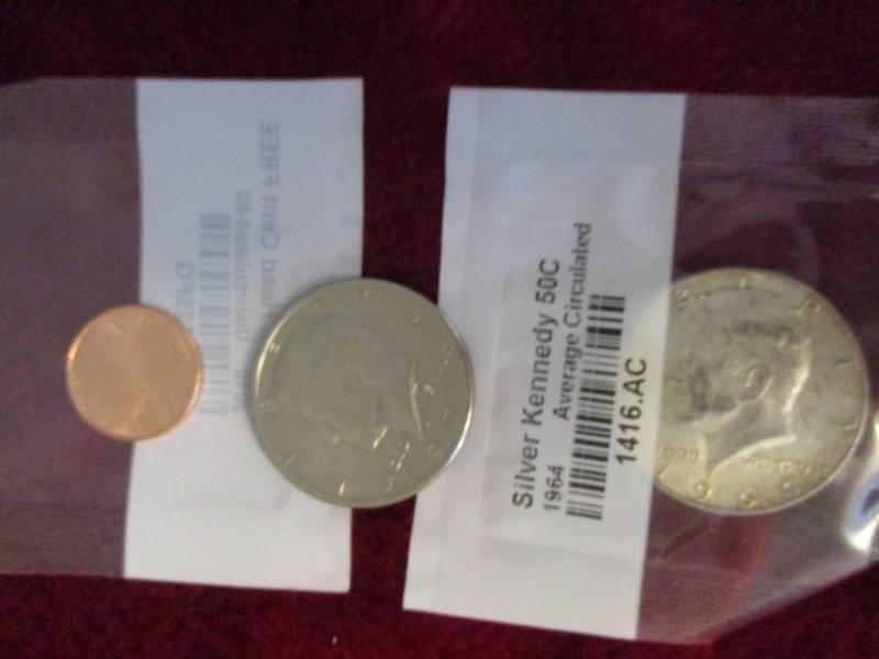 lot 206 image: 1964 and 1971 Kennedy 50 cent and Uncirculated Penny 2010