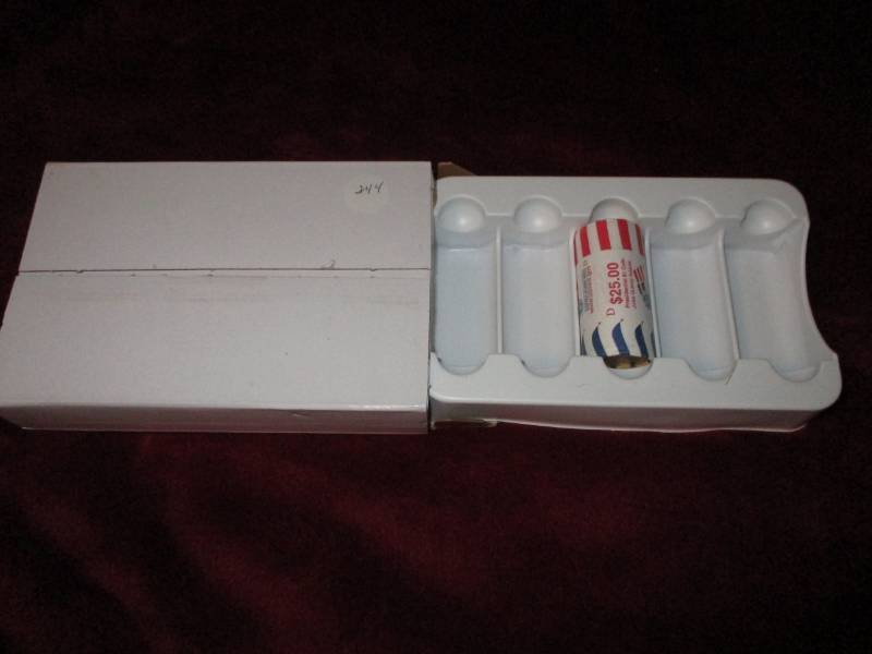 lot 244 image: 1 Roll of 25 Presidential Dollars J.Q.Adams