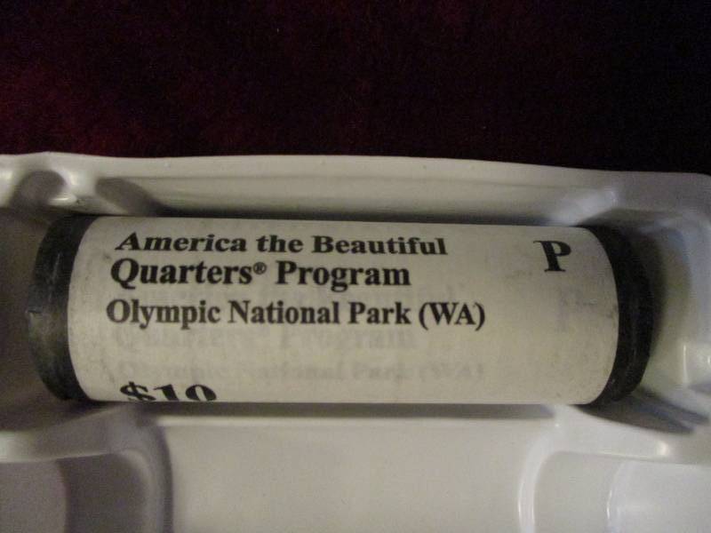 lot 253 image: 2011 P roll of Olympic Quarters