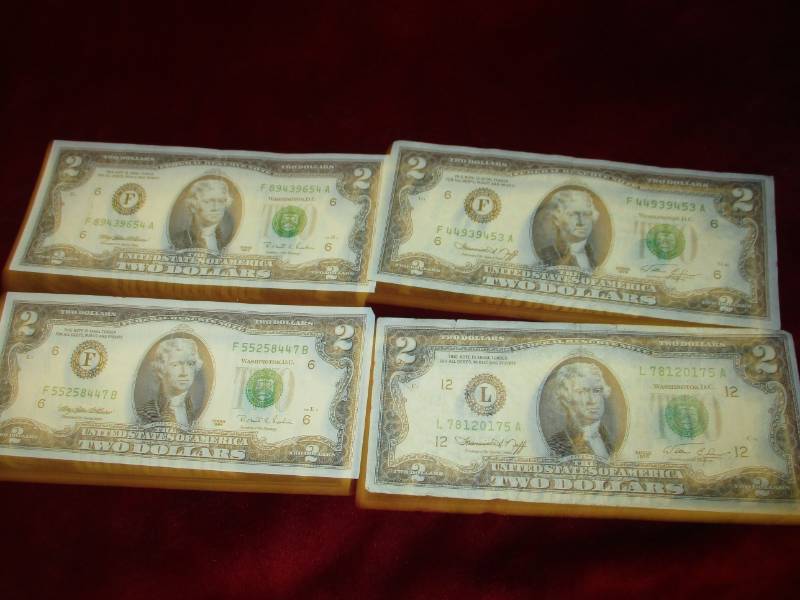 lot 294 image: 4 about unciculated $2 Bills 1976 and 1995