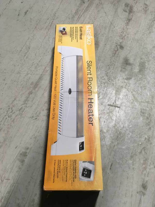 lot 11 image: Lasko 1,500-Watt Low Profile Silent Room Heater with Digital Display, White open box in like new condition