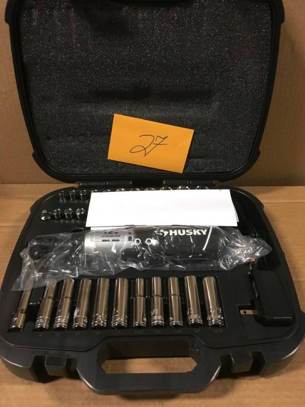 lot 27 image: Husky 12-Volt Lithium-Ion 38 in. Drive Cordless Ratchet W 34 Piece Socket Set, Battery, Charger, and Carrying Case open box in like new condition