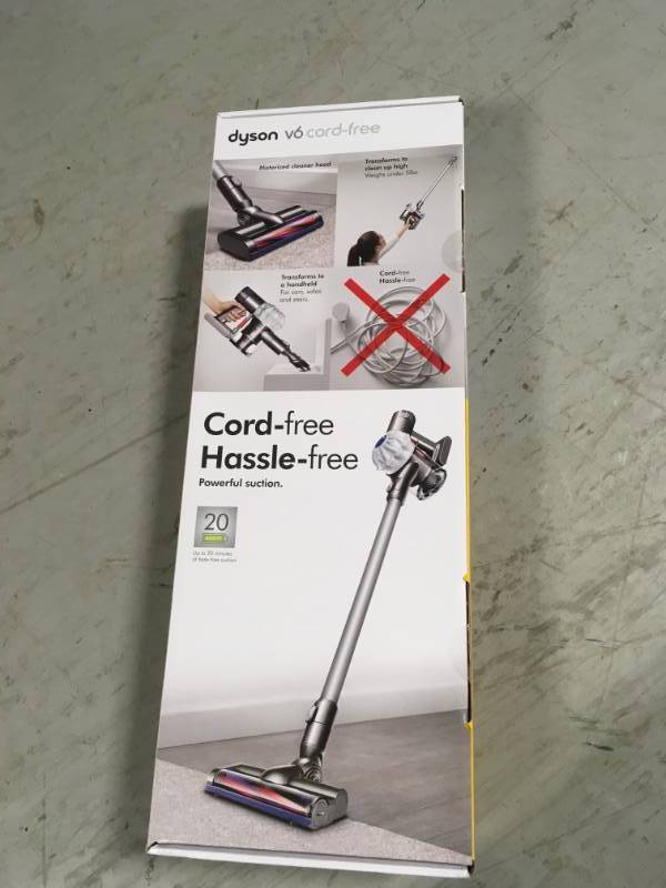 lot 44 image: Dyson V6 Cordless Stick Vacuum open box in like new condition