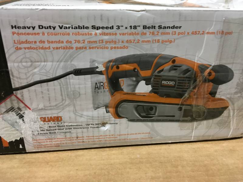 lot 64 image: RIDGID 6.5 Amp Corded 3 in. x 18 in. Heavy-Duty Variable Speed Belt Sander with AIRGUARD Technology in very good condition