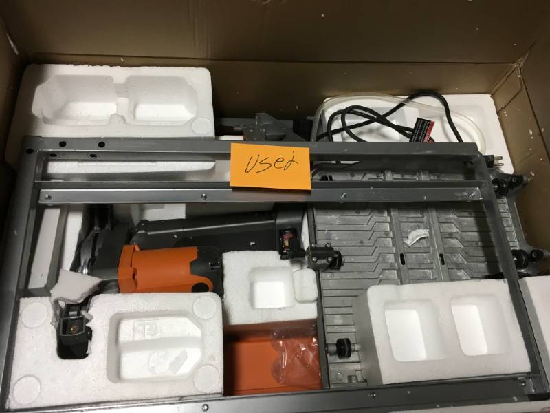 lot 72 image: RIDGID 7 in. Tile Saw with Stand USED in good condition