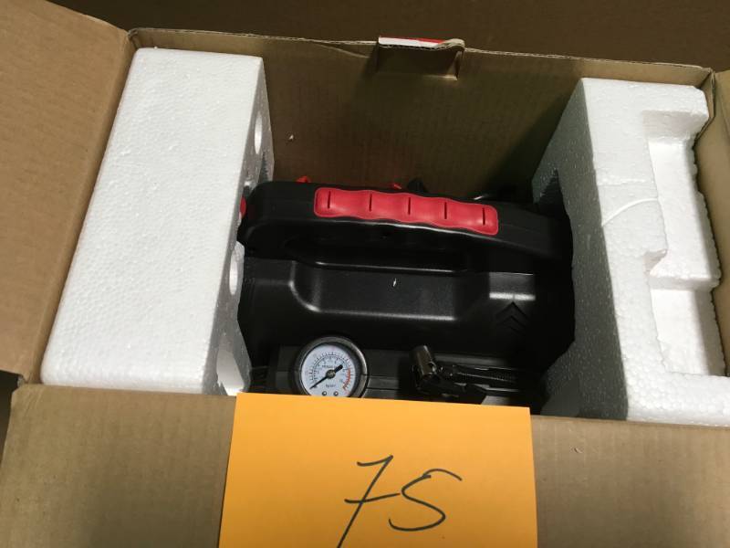 lot 75 image: Husky 8-in-1 12-Volt Power SourceJumpstarter in very good condition