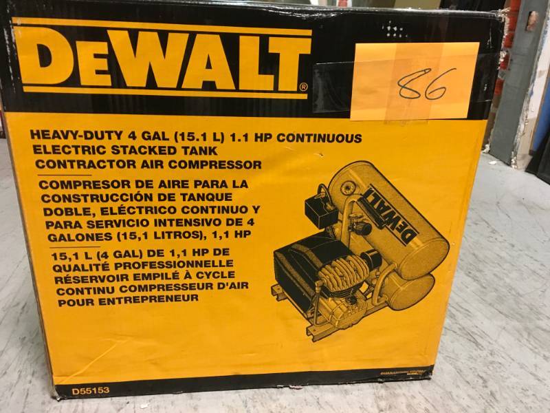 lot 86 image: DEWALT 4 Gal. Portable Electric Air Compressor open box in like new condition