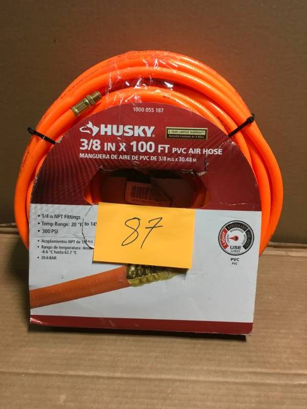 lot 87 image: Husky 38 in. x 100 ft. PVC Air Hose open box in like new condition