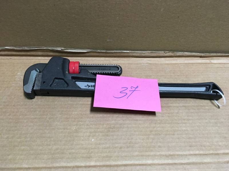 lot 37 image: Husky 18 in. Heavy-Duty Cast Iron Pipe Wrench with 2 in. Jaw Capacity in like new condition