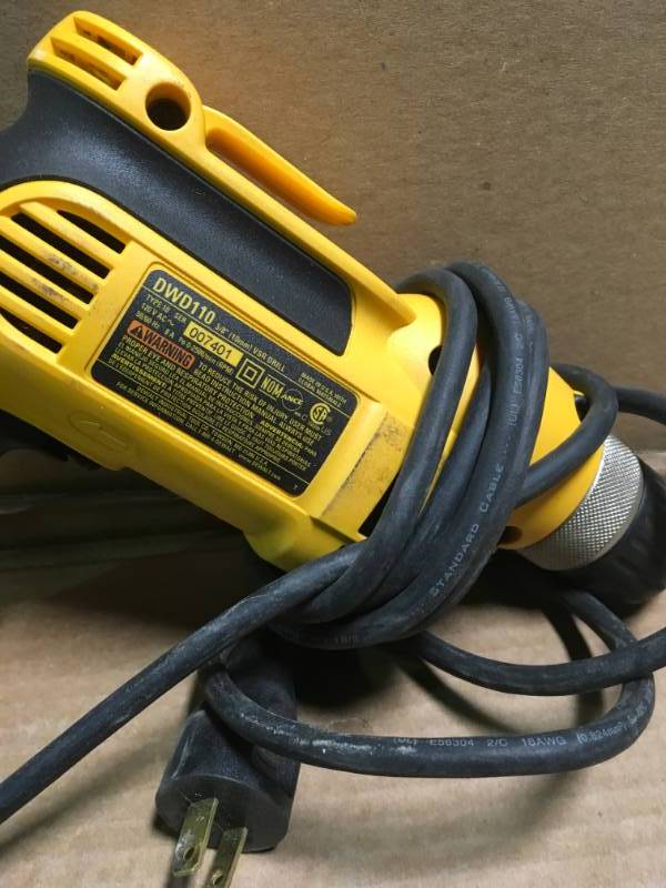 lot 50 image: DEWALT 8 Amp Corded 38 in. Pistol Grip Drill USED in good condition