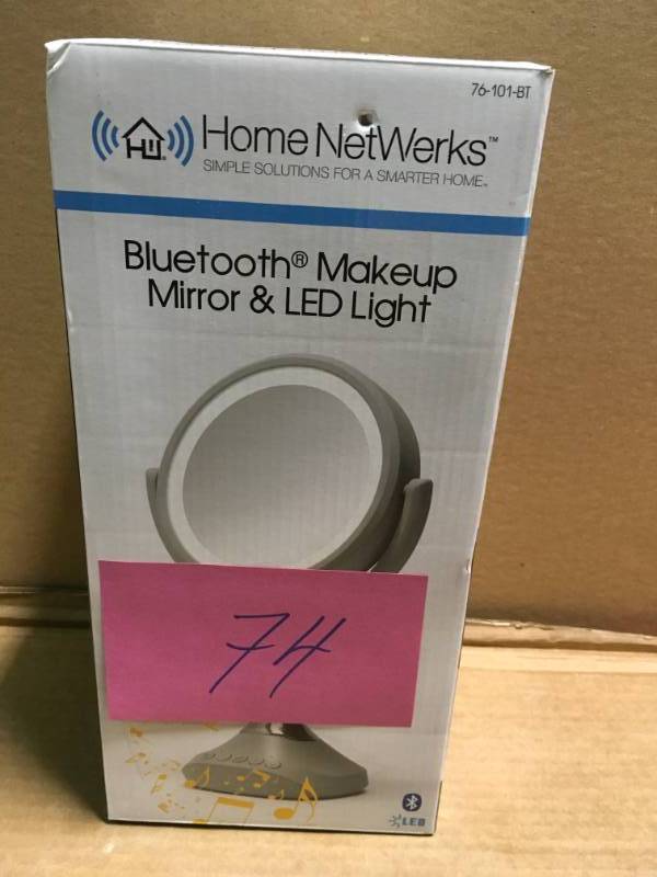 lot 74 image: Home Netwerks 6.25 in. x 12.5 in. Bi-view Bluetooth LED Handheld Makeup Mirror in Gray in like new condition