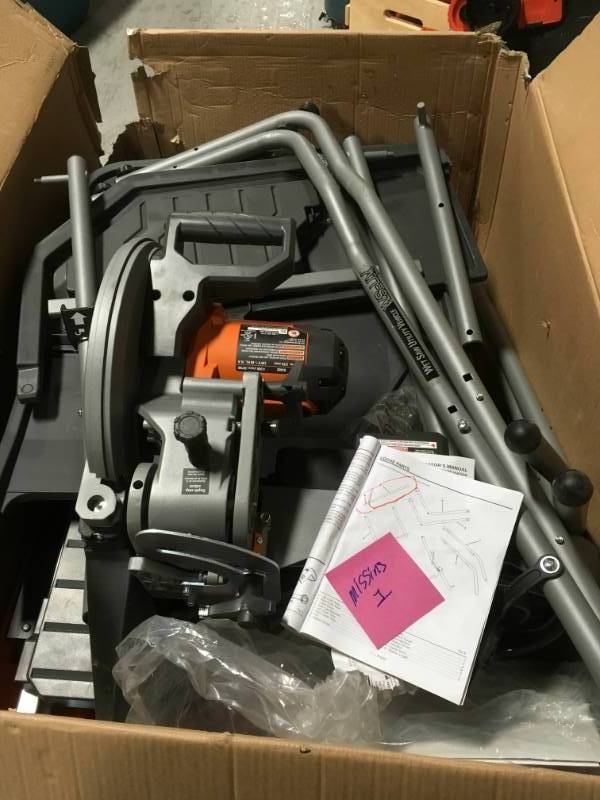 lot 76 image: RIDGID 10 in. Wet Tile Saw with Stand MISSING ONE PART for the stand SEE PHOTO MANUAL in working conditions