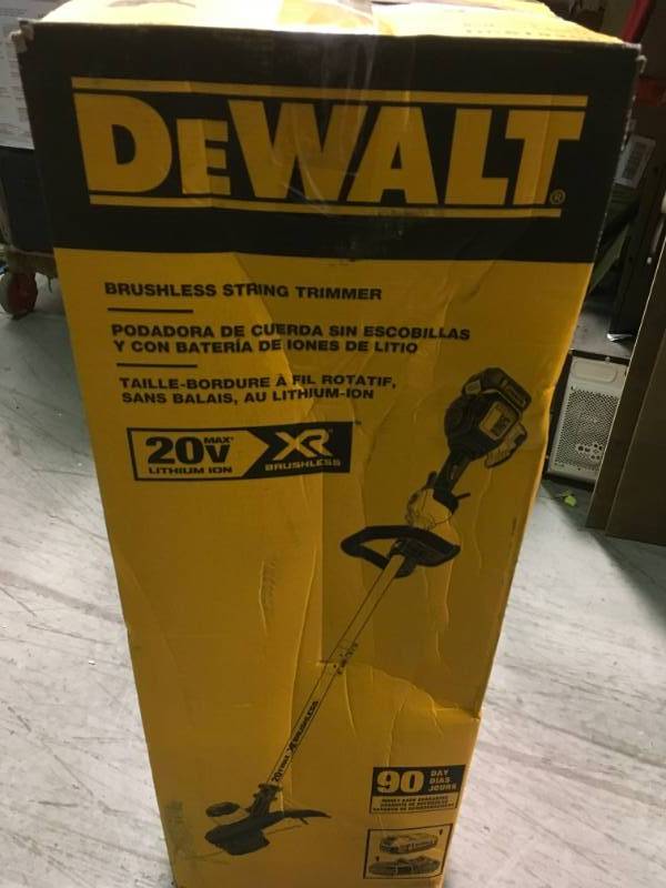 lot 91 image: DEWALT 20-Volt MAX Lithium-Ion Cordless 13 in. Brushless Dual Line String Grass Trimmer with 5.0Ah Battery and Charger Included in like new condition
