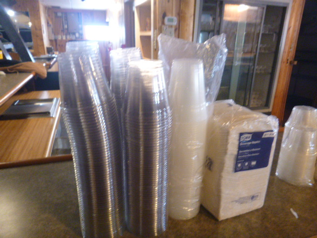 lot 213 image: Plastic Drink Glasses and Napkins