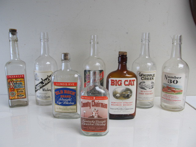 lot 66 image: Group of Old Vintage Whiskey Bottles