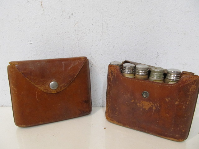 lot 135 image: 2 Antique Leather Travel SpiceMedicine Bottle Carriers