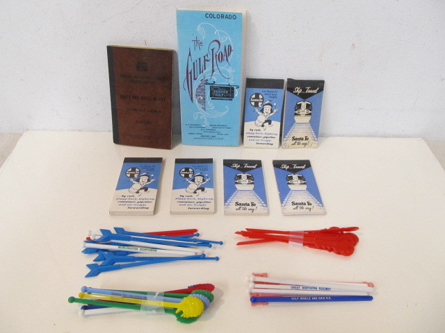 lot 141 image: Lot of Vintage Railroad Swizzle Sticks Timetables etc