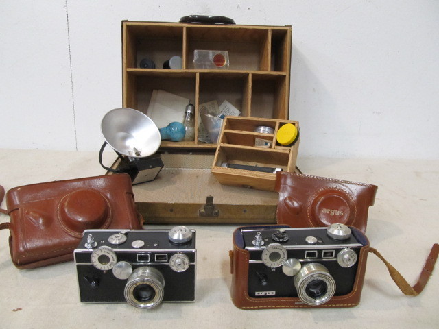 lot 143 image: Group of Vintage Cameras in Metal Case