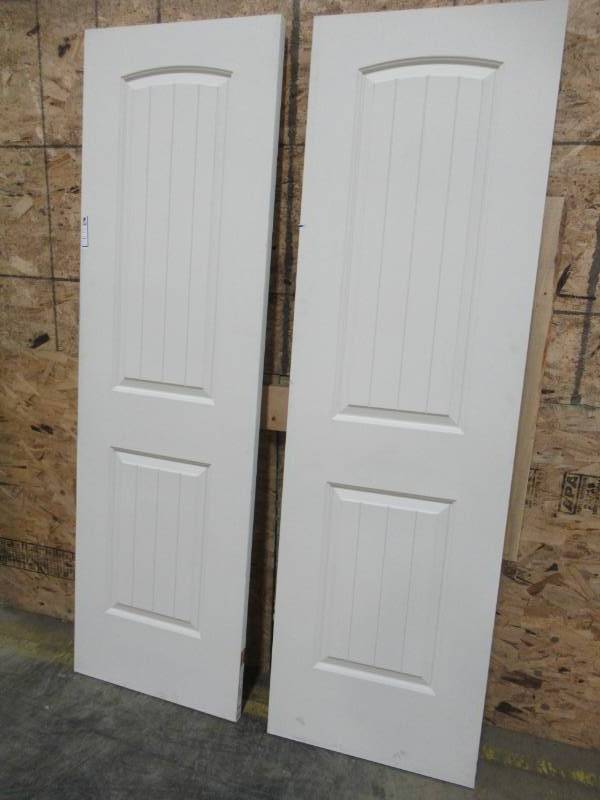 lot 61 image: (2) ReliaBilt 24 x 80 2-Panel Hollow Interior Slab Doors - No Bore
