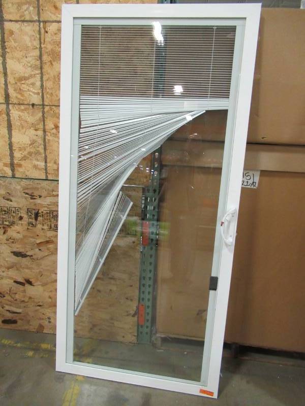 lot 9 image: Pella Silding Glass Door with Screen Issues and Missing Top Roller Glides In White