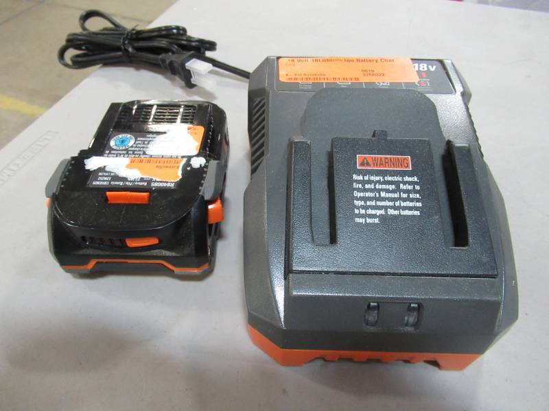 lot 171 image: RIDGID  18 Volt 18Lithium Ion Battery & Charger, R86092
