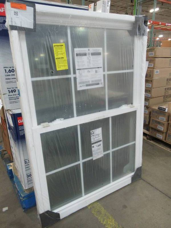 lot 79 image: Pella 250 Series Double Hung Vinyl Replacement Window With Full Unit Screen And Muntin Between Glass.