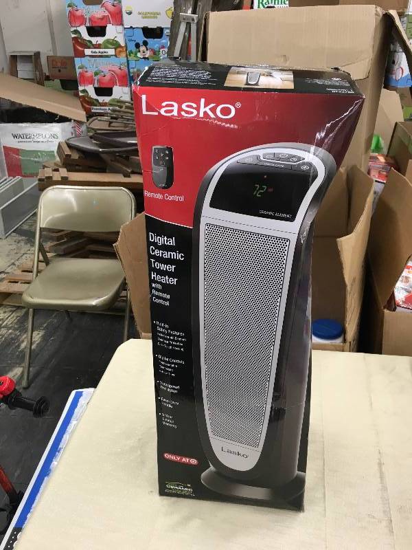 lot 245 image: Lasko Ceramic Tower Indoor Heater, Retail $49.99
