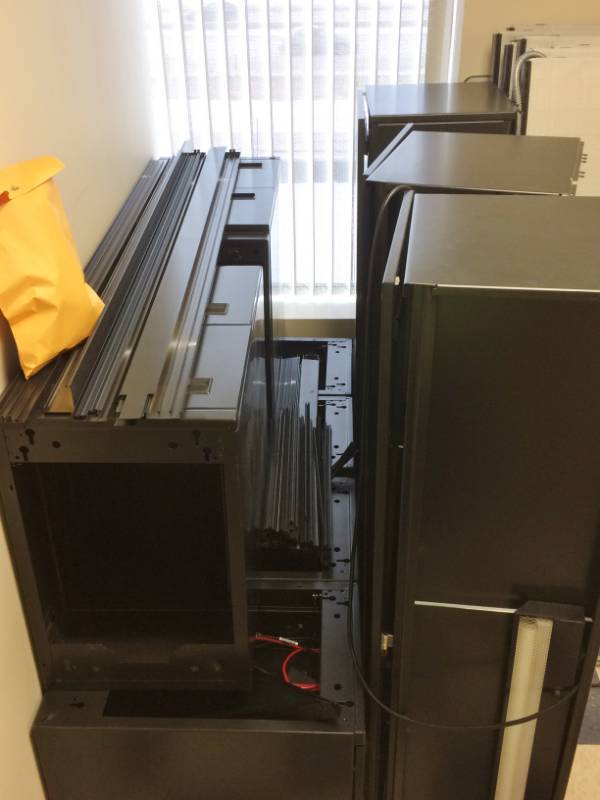 lot 41 image: 3 Disassebled&nbspHigh Quality 3 Haworth Cubicle Workstations Fully Loaded With Lighted Overhead Cabinets 2 & 3 Drawer Filing Cabinets - From What We Can See The Condition Looks Great...though One Panel Has a Stain.