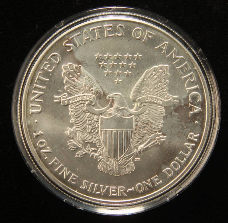1999 COLOR ENHANCED SILVER EAGLE 1 TROY OZ. .999 FINE SILVER IN AIRTITE