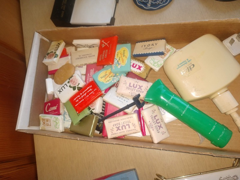 lot 67 image: Vintage Hotel Soaps, Collectible Coasters, and Crafts.