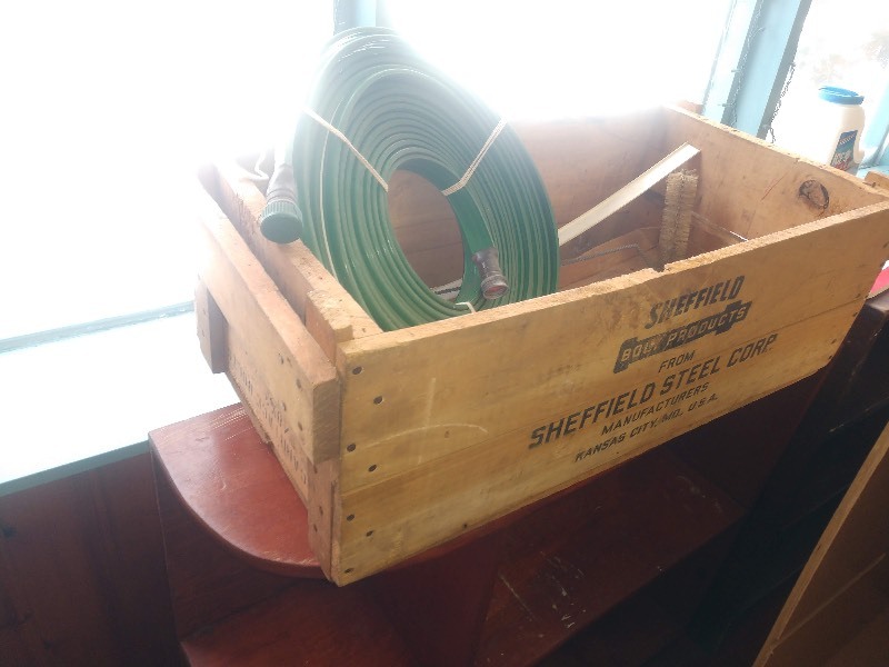 lot 35 image: Hose and Antique Sheffield Steel Corp Wood Crate