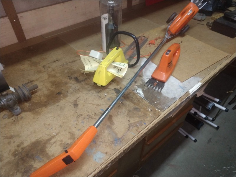lot 51 image: Cordless Disston Shrub Trimmers and Black & Decker Drill Guide