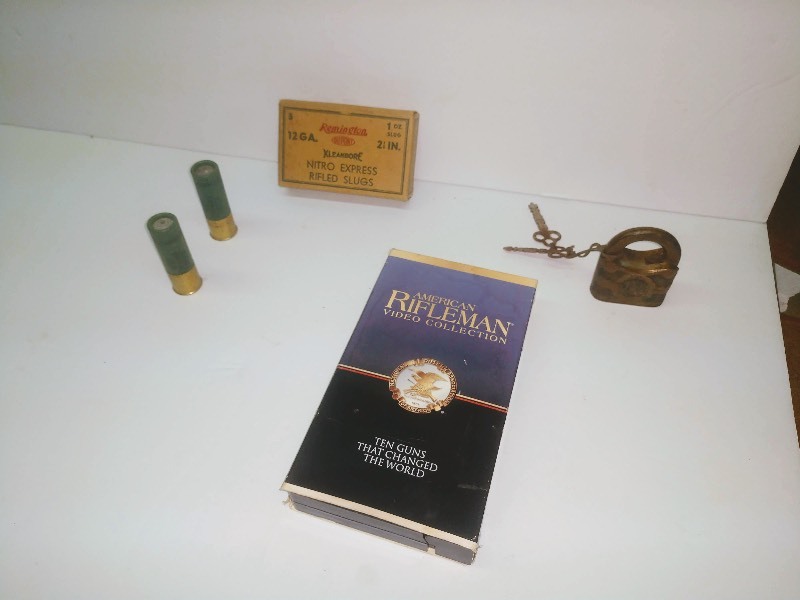 lot 23 image: Remington Kleanbore Nitro Express Rifled Slugs, American Rifleman VHS, Antique Yale Lock and Keys