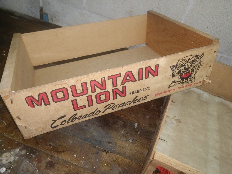 lot 93 image: Primitive Mountain Lion Colorado Peaches Wood Crate and Primitive BIO-TREAT Wood Crate