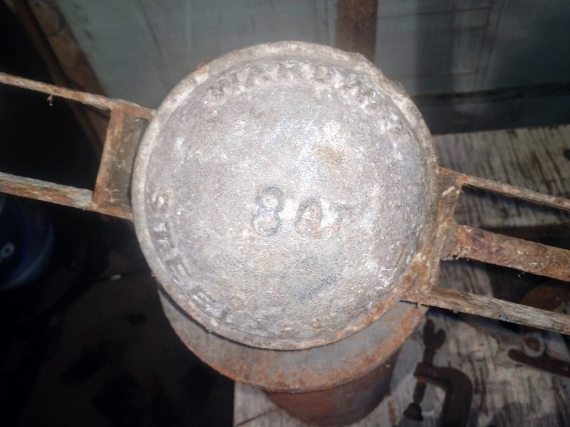 lot 134 image: Vintage Cast Iron Hand Saw Vise, Vintage Hay Spike, and Steampunk Utility Mixer