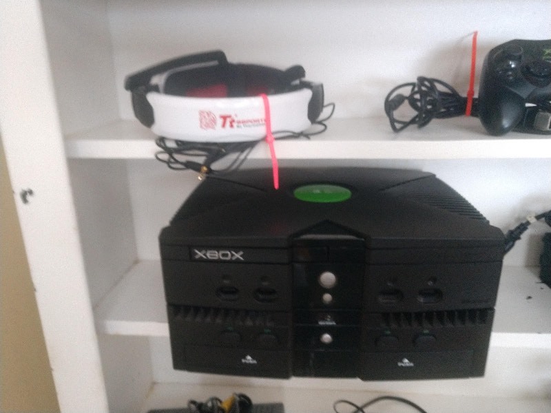 lot 141 image: Previously Owned XBOX, Playstation3, Cords and Other Gaming Accessories