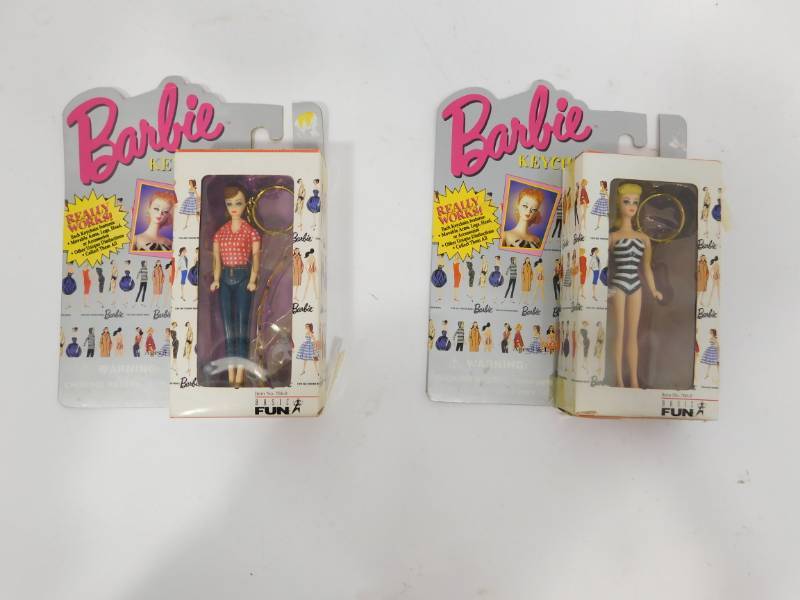 lot 61 image: Two Barbie Keychains In Fashionable Outfits