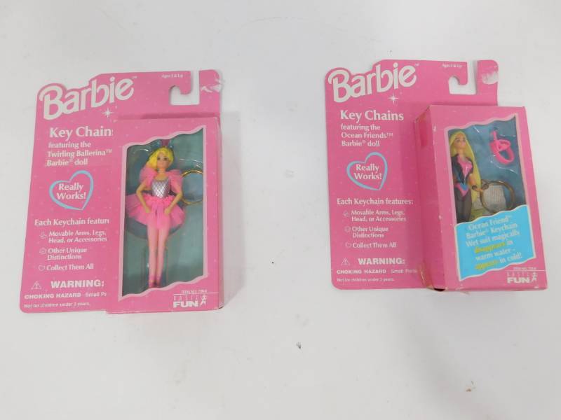 lot 62 image: Two Barbie Keychains In Fashionable Outfits