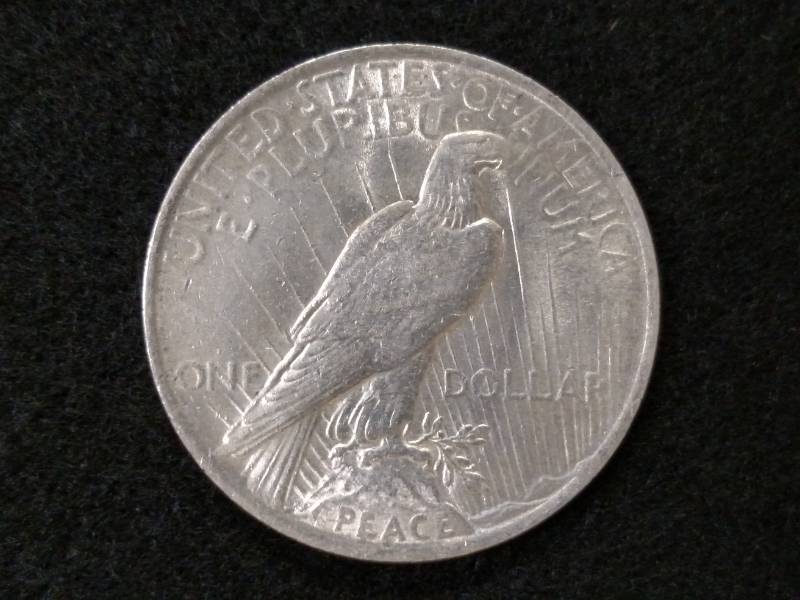 lot 19 image: 1923 Peace Silver Dollar...