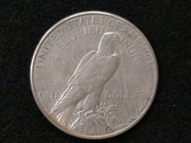 lot 22 image: 1923 S Peace Silver Dollar...