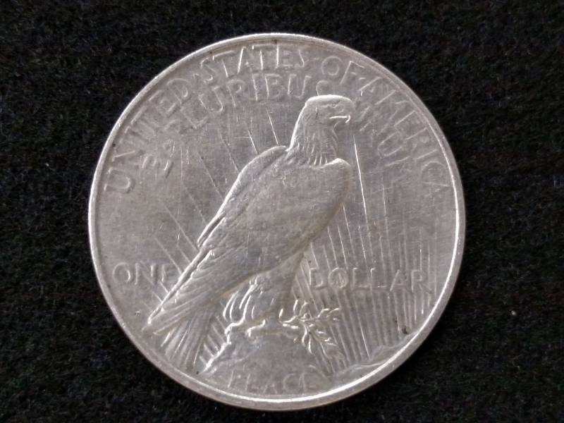 lot 25 image: 1927 D Peace Silver Dollar...