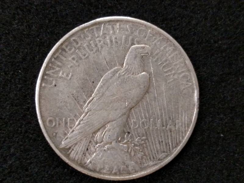 lot 28 image: 1934 D Peace Silver Dollar...