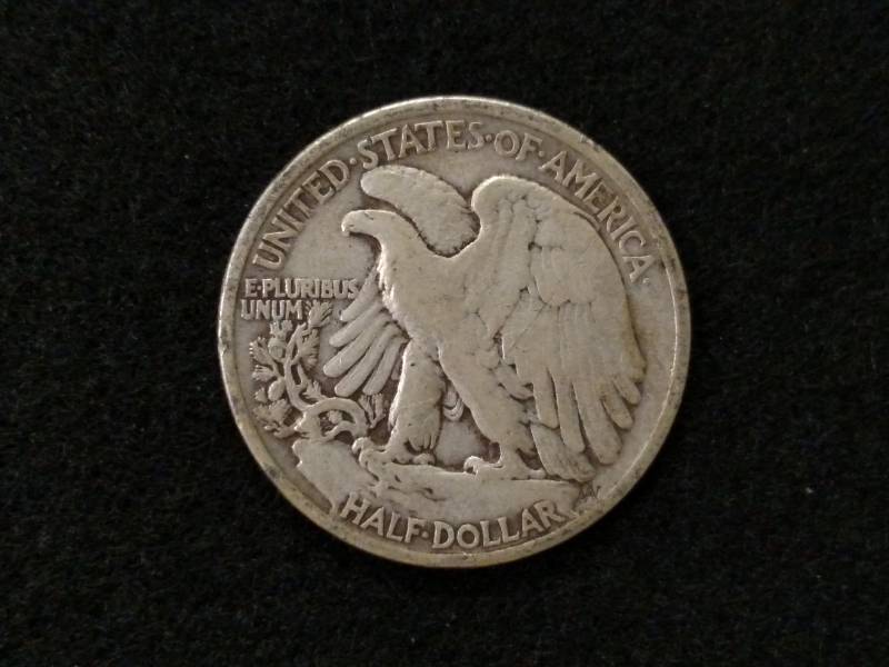 lot 34 image: 1935 Walking Liberty Silver Half Do...