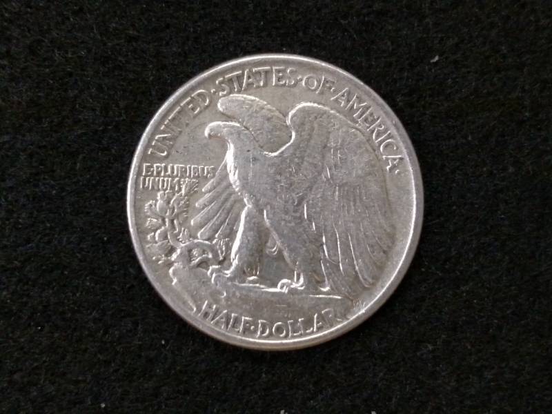 lot 54 image: 1945 Walking Liberty Silver Half Do...
